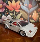 Hvit Lamborghini Countach modellbil 1:18 Burago Italia Italy 1988 thumbnail
